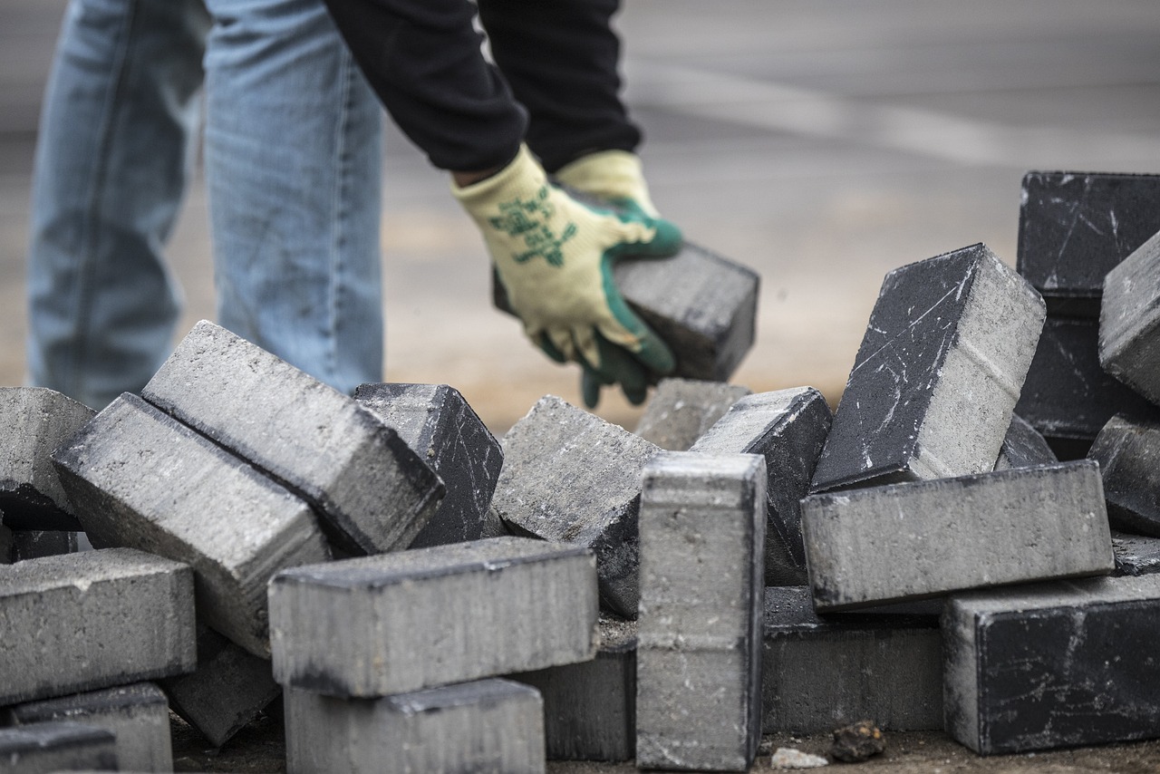 a pile of grey paver bricks